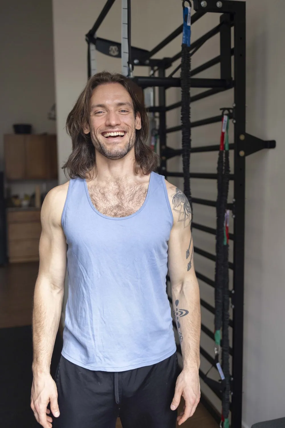 Evan Kueffner, personal trainer and owner of As Within, in his Asheville studio